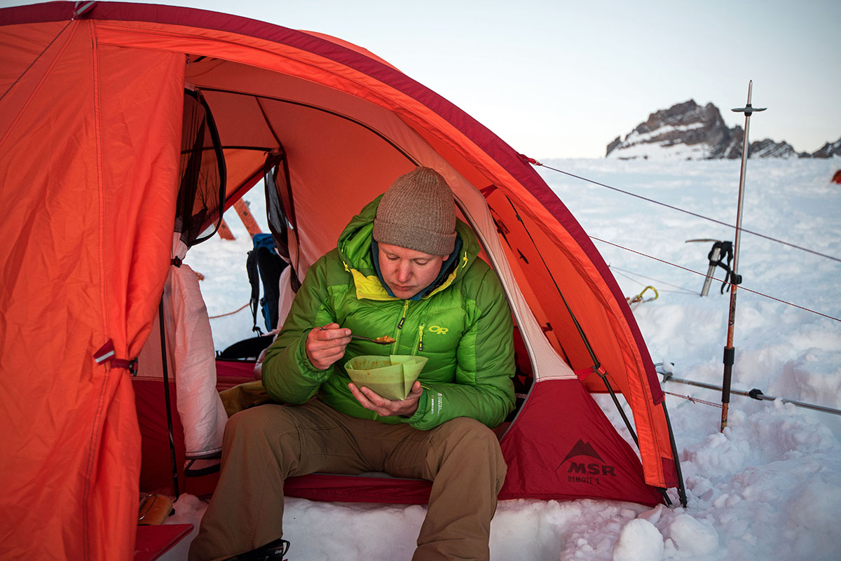 A man eating meal in the MSR Remote