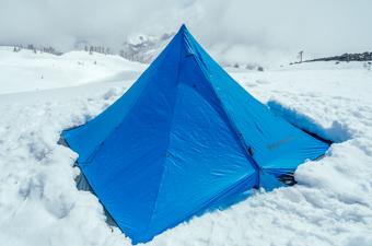 A 4-season tent pitched in the snow