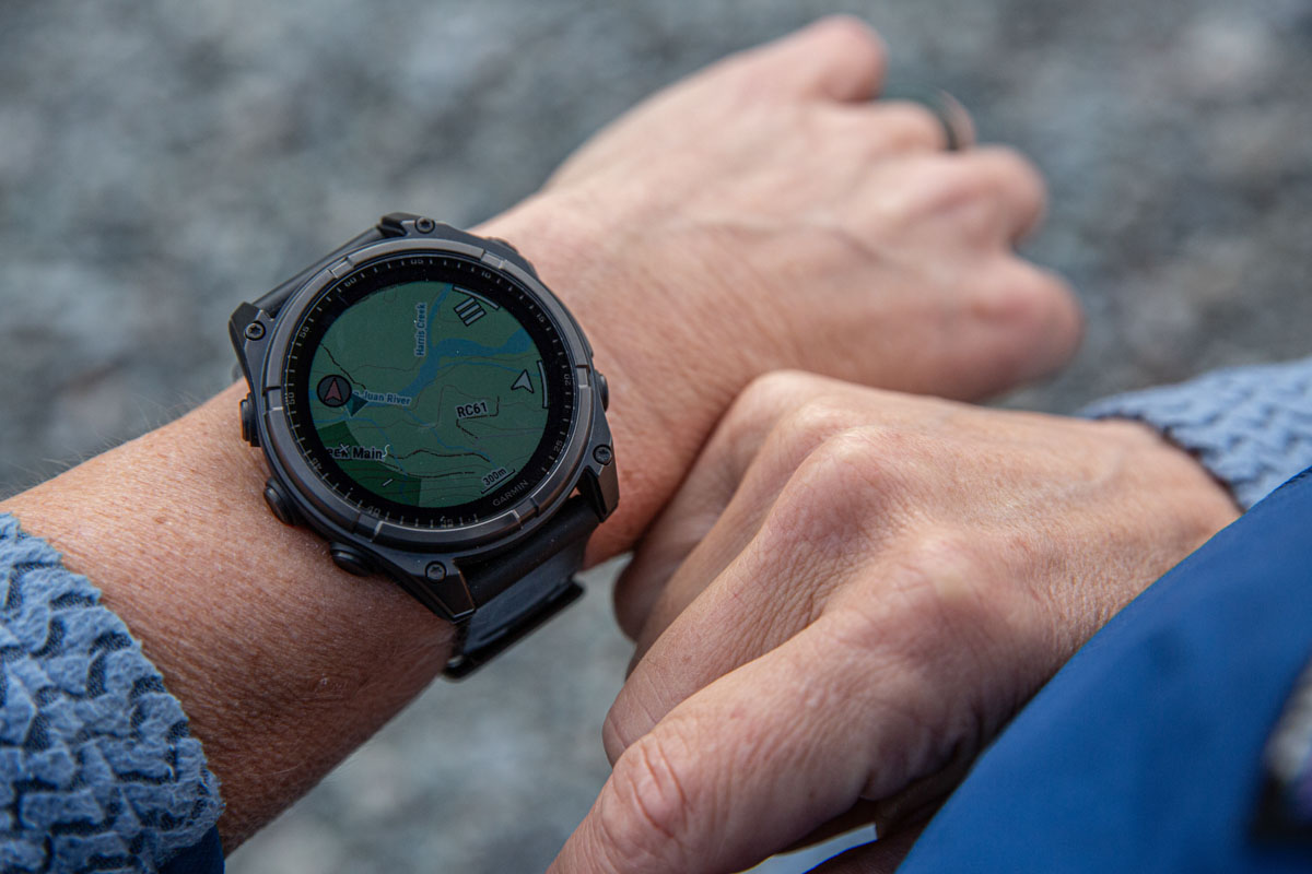 A close up of a GPS watch on a wrist