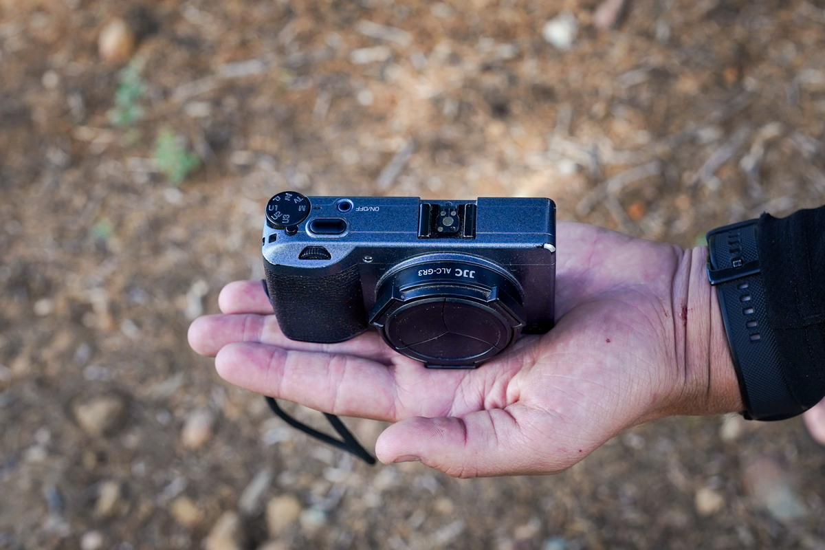 A closeup of a small point-and-shoot camera
