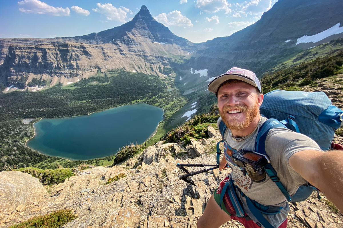 A man hiking with a Sony camera