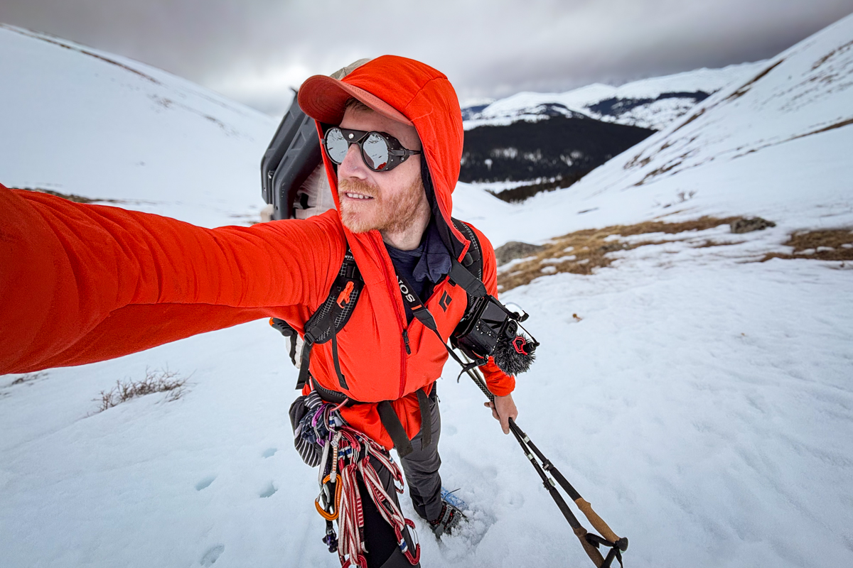 A man carrying the Sony a7III on a climbing trip in Colorado