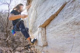 A climber clips the chains of a sport climb in Chattanooga, TN