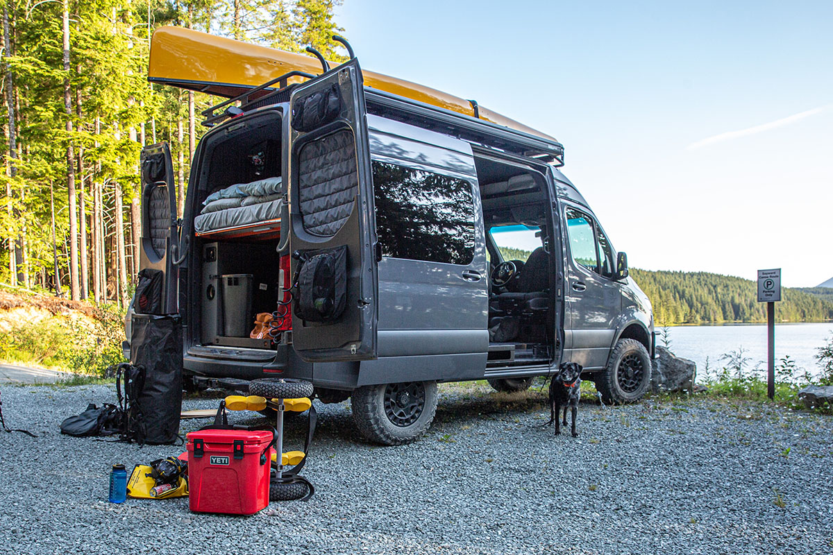 A cooler next to a van