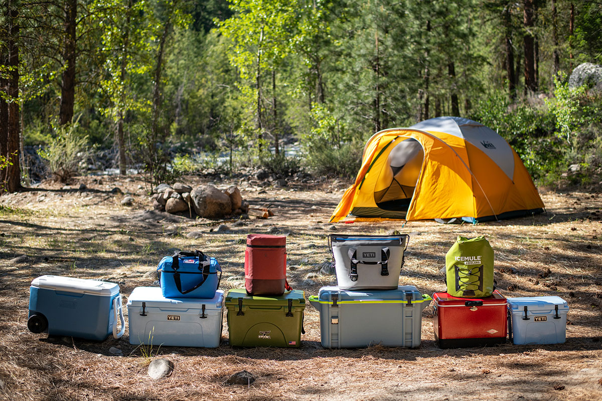 A collection of coolers at a campsite