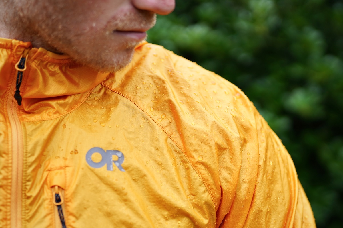 A DWR coating on a OR windbreaker jacket repelling rain drops.