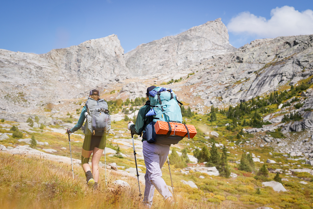 Two women hiking with the Arc'teryx Gamma Pants in the Winds