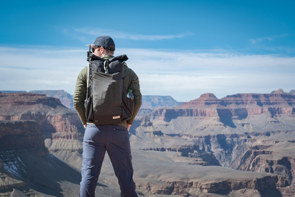 A man testing the Outdoor Research Ferrosi pants in the Grand Canyon