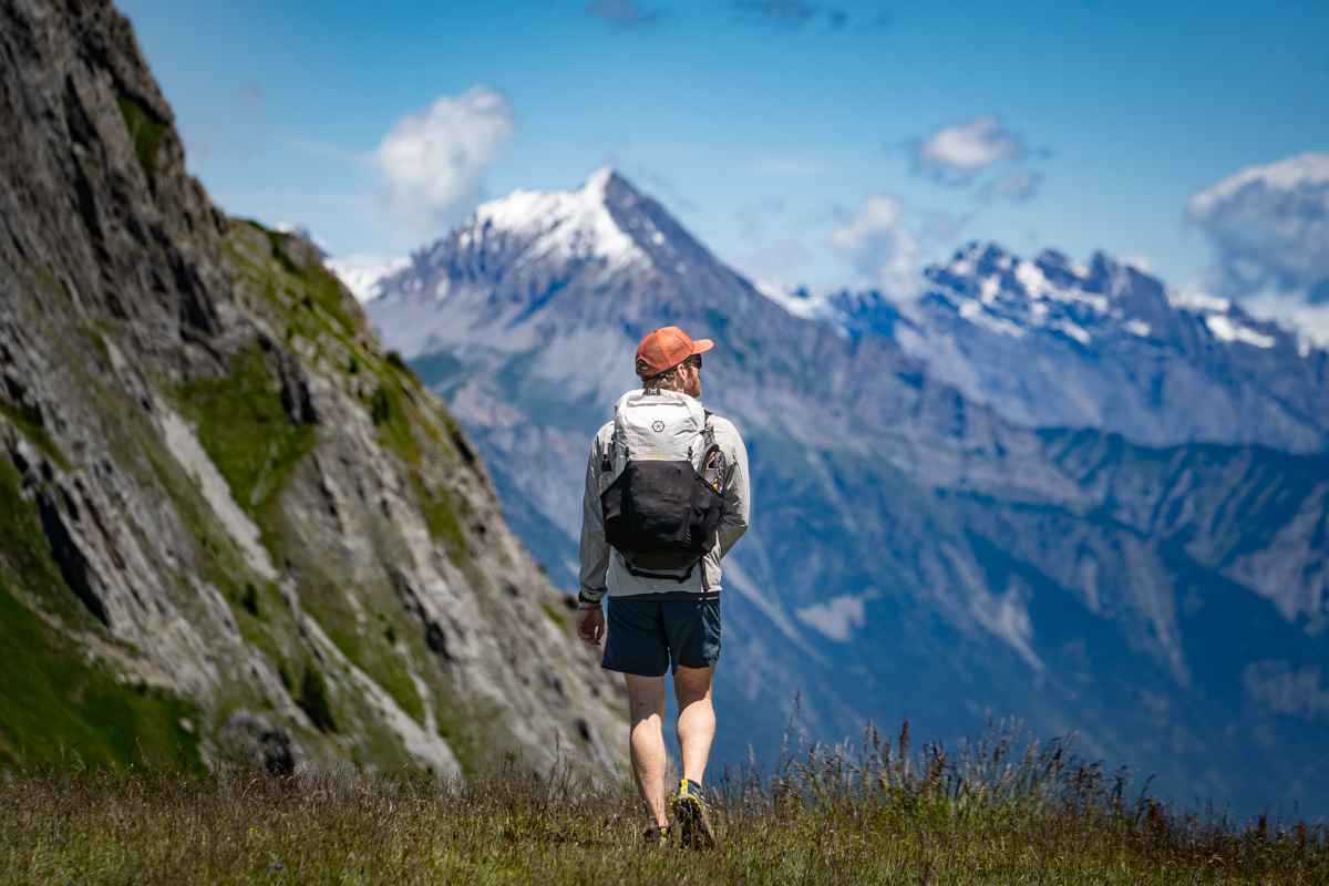 A man hikes in the Alps with the Altra Lone Peak 9