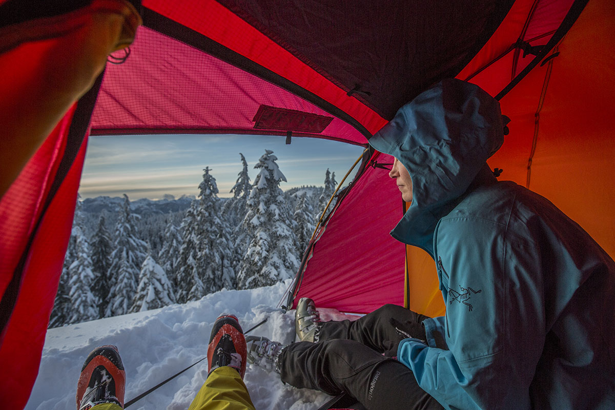 A woman looking out of the Hilleberg Allak