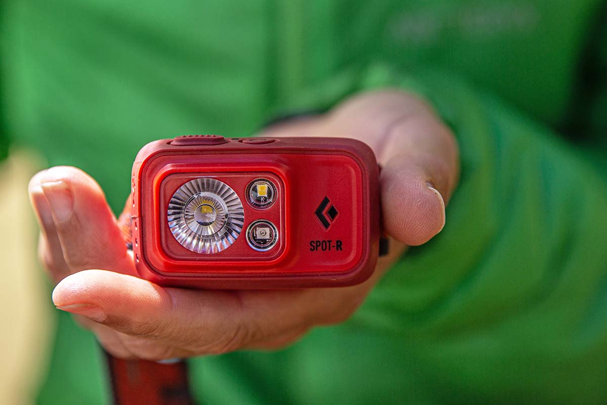 Someone holding the Black Diamond Spot 400-R headlamp