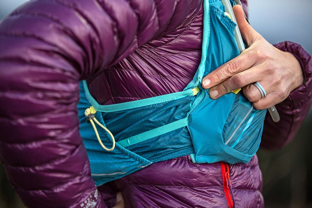 A running vest featuring side adjustment toggles.