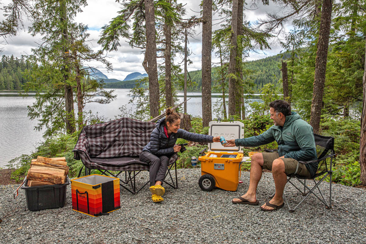 two people sharing a drink over the cooler