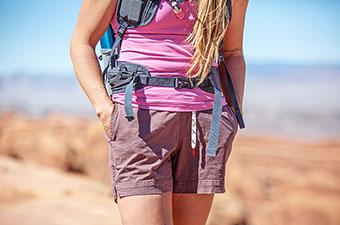 A closeup of the Topo Designs Dirt Short while hiking in the desert